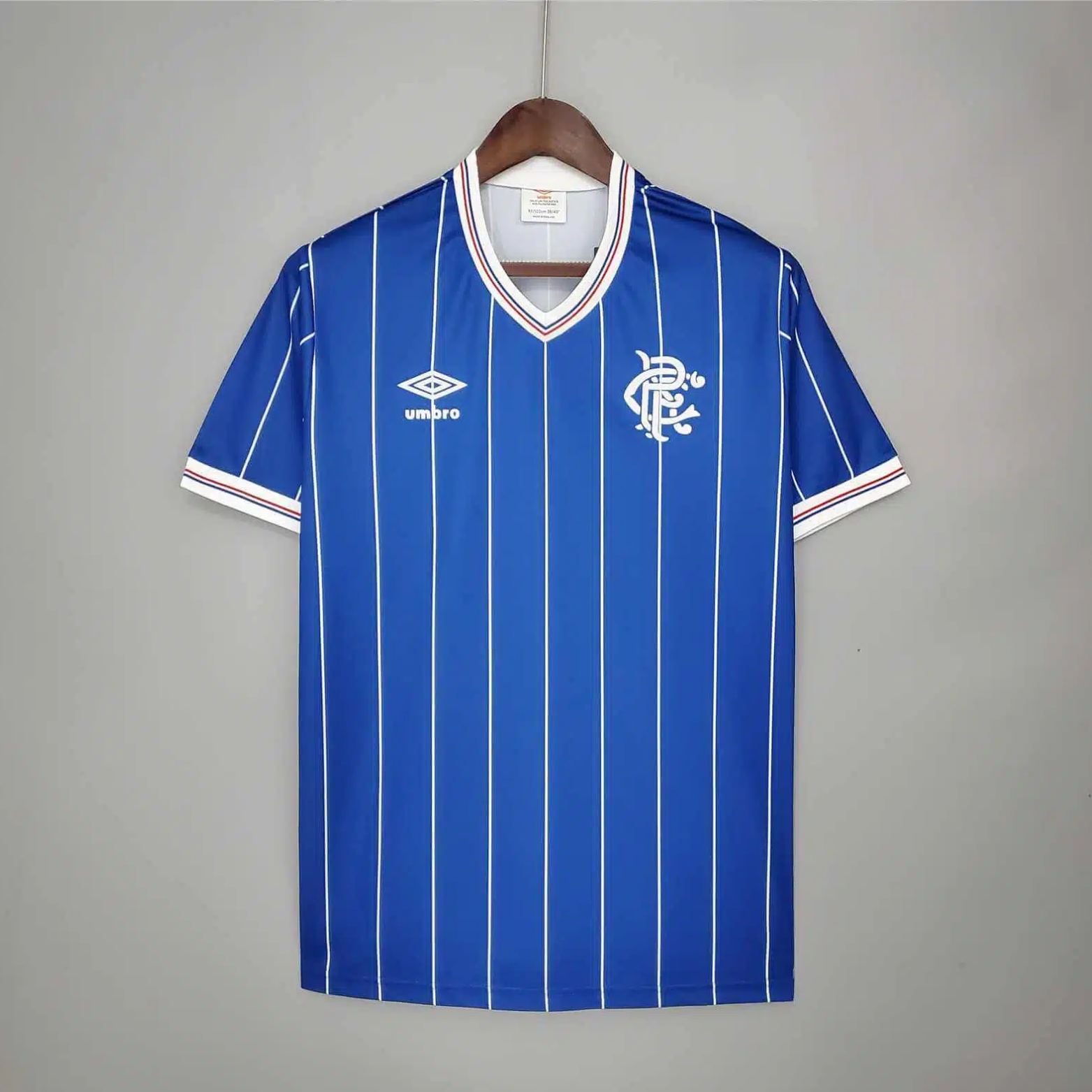 Blue striped Rangers sports jersey from 1982/83 made by Umbro 